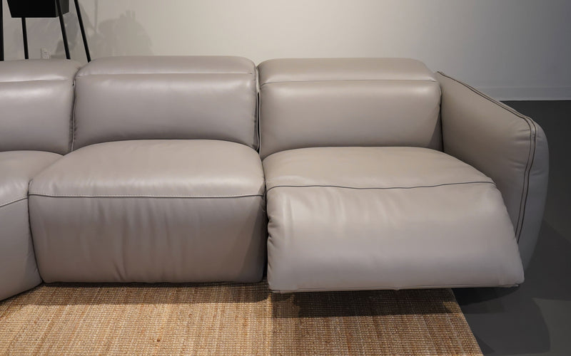 Capitalize on your space. This modern sectional sofa is the perfect accent piece for any living room, entertainment room, bedroom, or loft. Available in a range of material and color options.